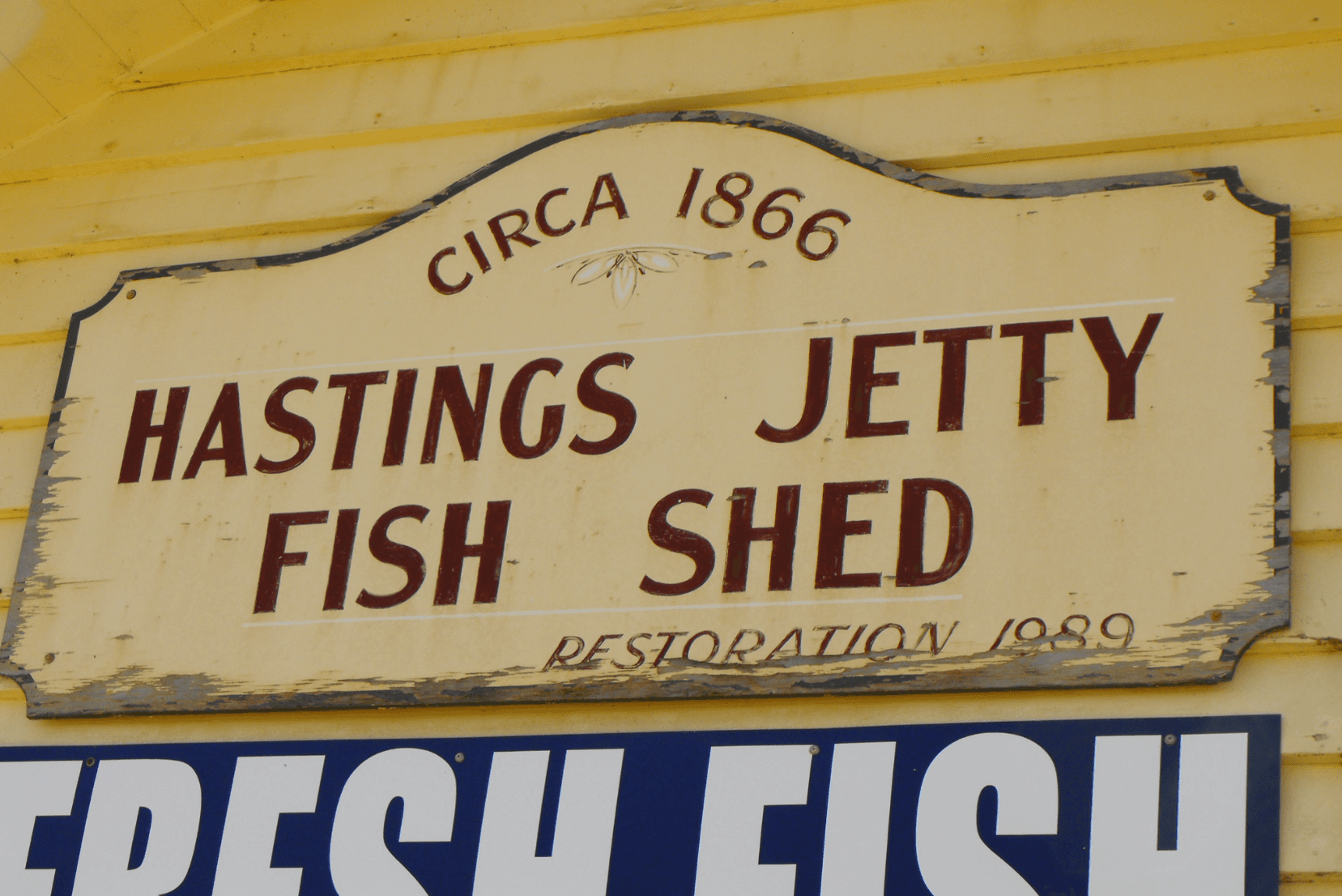 An old sign shows that a fish business was established in 1866.